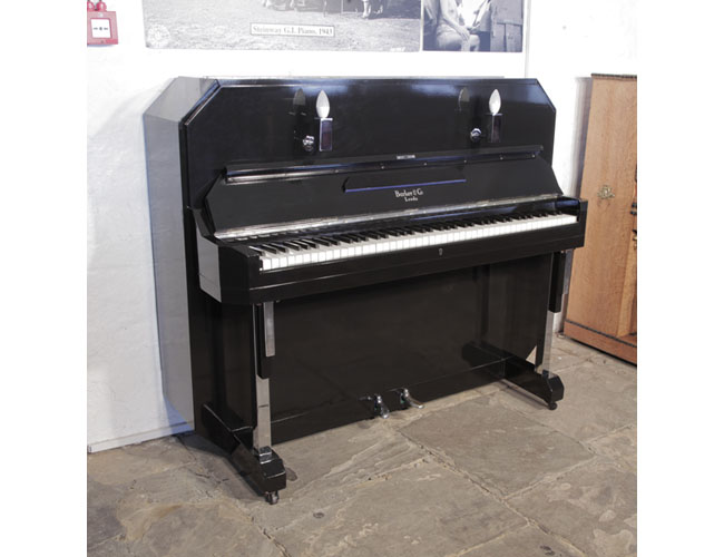 Barker upright piano for sale with an Art Deco style, black case. Cabinet features strong angular styling and chrome fittings