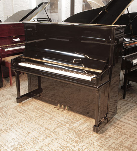 Reconditioned 2011,  Besbrode upright piano for sale with a black gloss case and brass fittings