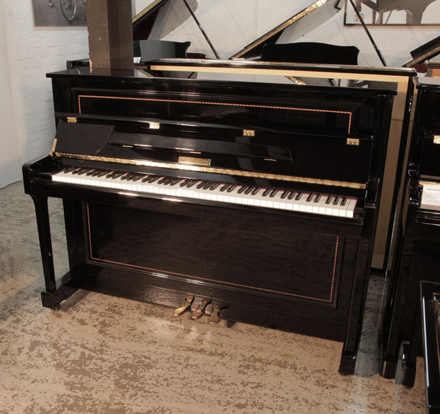 Reconditioned 2016, Pinkham upright piano for sale in black gloss with crossbanded stringing accents. Piano has an eighty-eight note keyboard and three pedals.  