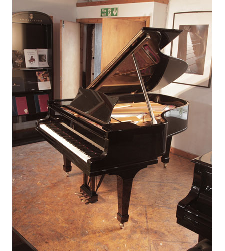 Restored 1916, Steinway Model A grand piano with a with a black case and spade legs.. Piano has an eighty-eight note keyboard and a three-pedal lyre.  