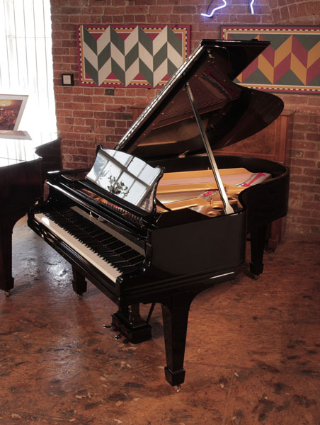 Rebuilt, 1921, Steinway Model O grand piano for sale with a black case and spade legs. Piano has been rebuilt in Germany by Steinway Academy trained technicians using 100% Steinway parts. Piano has an eighty-eight note keyboard and a two-pedal lyre.