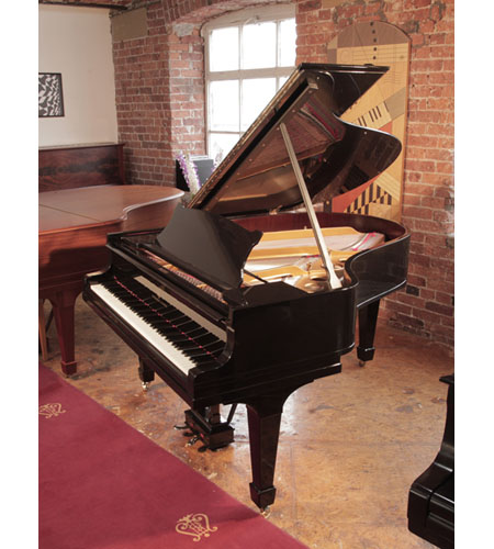 Rebuilt, 1925, Steinway Model O grand piano with a with a black case. Piano has an eighty-eight note keyboard and a two-pedal lyre.