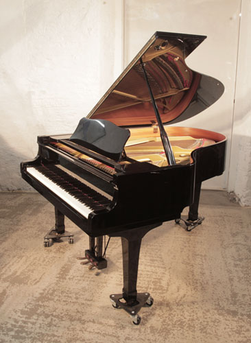Reconditioned, 1988, Yamaha C3 conservatory grand piano for sale with a black gloss case and spade legs. Piano has an eighty-eight note keyboard and a three-pedal lyre.  