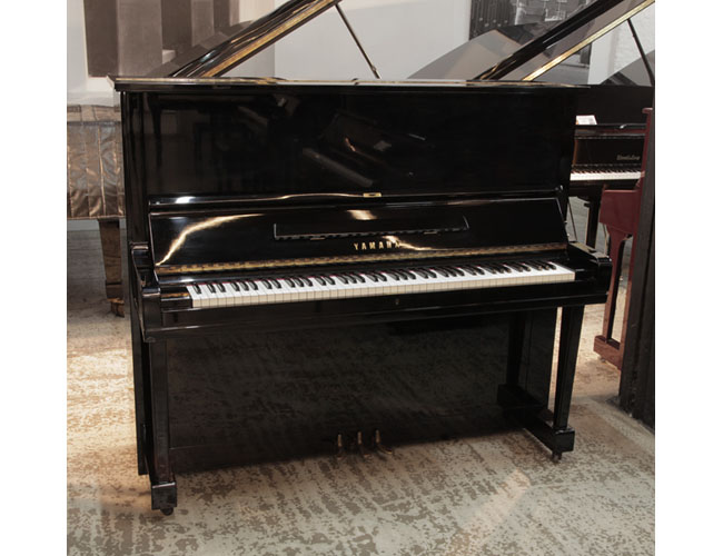Reconditioned, 1957, Yamaha U3 upright piano for sale with a black gloss case and brass fittings. Piano has an eighty-eight note keyboard and three pedals